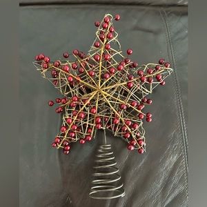 Wooden/metal Christmas tree topper with artificial cranberries.